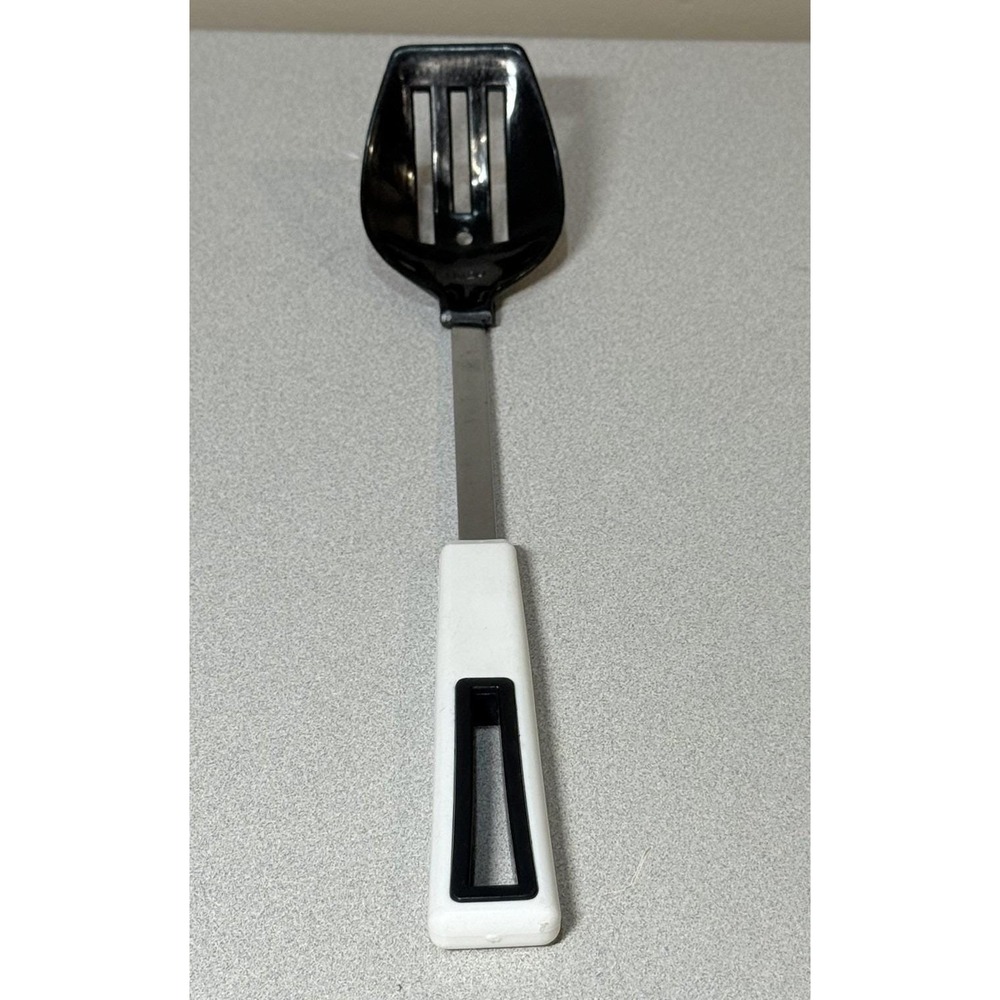 vintage Hoan black slotted serving spoon with a white handle nylon plastic SS